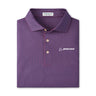 The Peter Millar Boeing Men’s Abbott Performance Polo is a folded purple shirt featuring a subtle pattern, four-way stretch, three-button placket, and a white Boeing logo on the left chest.