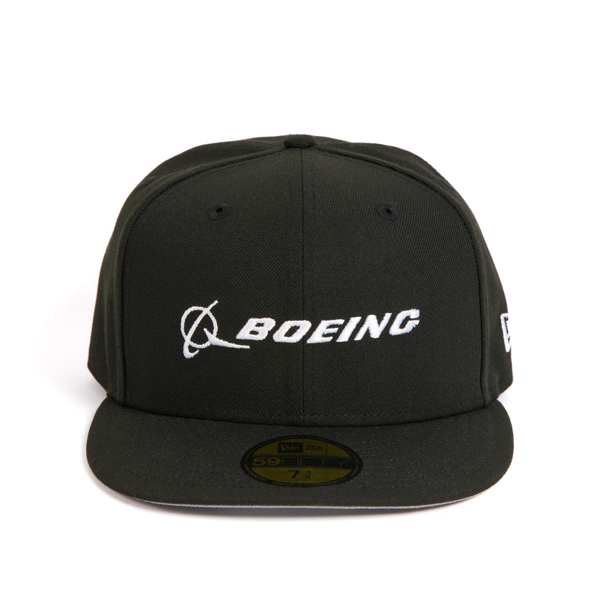 A dark green New Era 59FIFTY fitted cap from The Boeing Store features a flat brim, side New Era logo, and front white embroidered iconic Boeing logo.