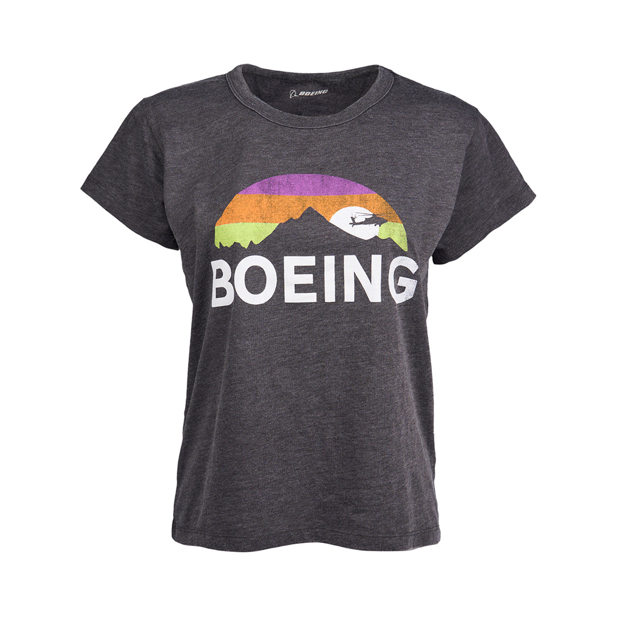 The Boeing Horizon Peak Womens T-Shirt features a stylish gray design with a vibrant mountain graphic, sunset in orange, pink, and green, an airplane silhouette soaring above, and BOEING boldly in white underneath.