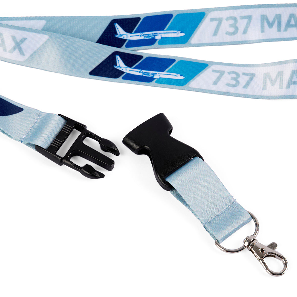 The Boeing 737 MAX Velocity Lanyard by Boeing features vibrant sublimation print with 737 MAX text and airplane graphics, and it includes a black plastic buckle and metal clip.