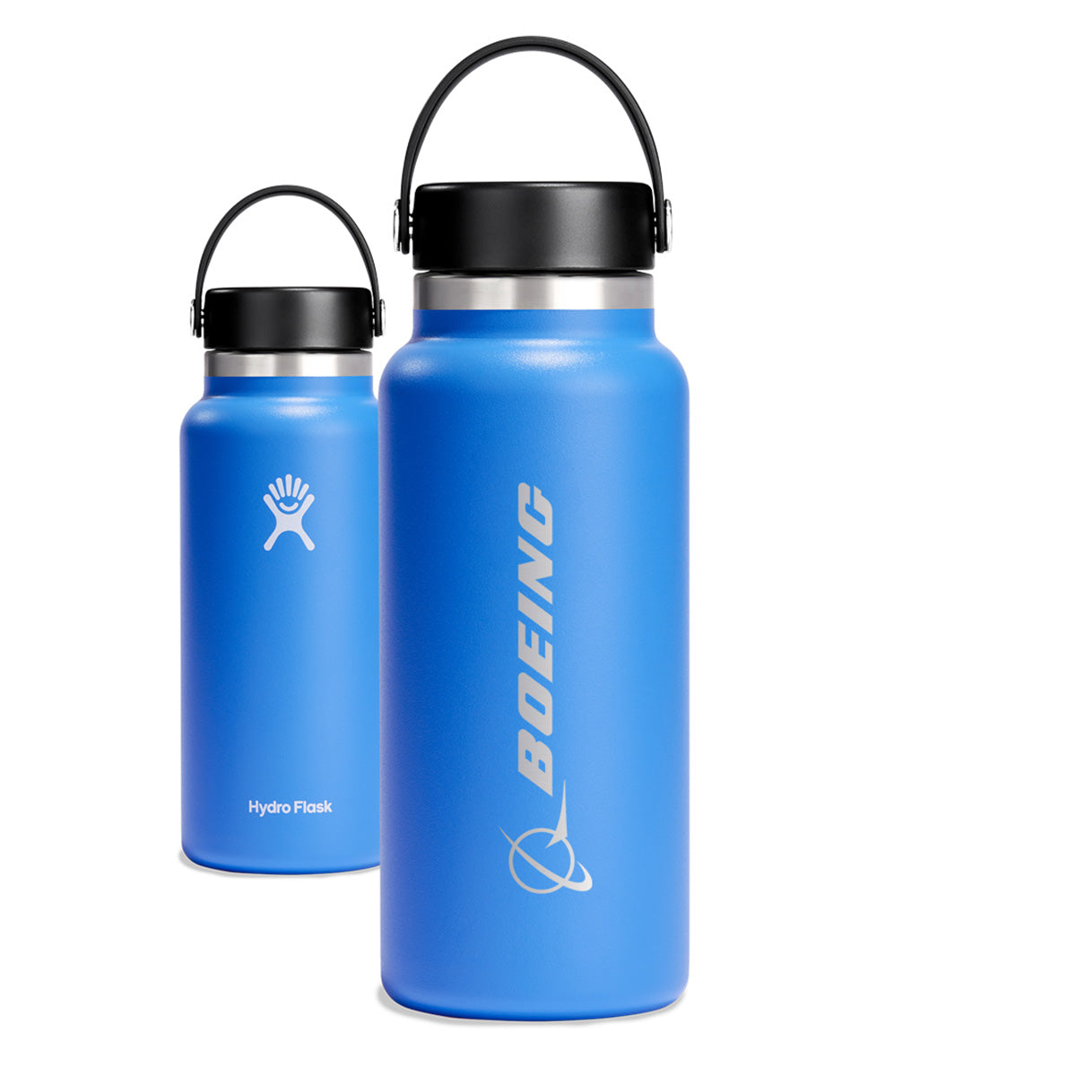 Two blue Hydroflask Boeing Water Bottles from The Boeing Store with black lids are shown. The front stainless steel bottle has a Boeing logo with an airplane graphic. Both bottles feature wide mouths, carrying handles, and the Hydro Flask branding.