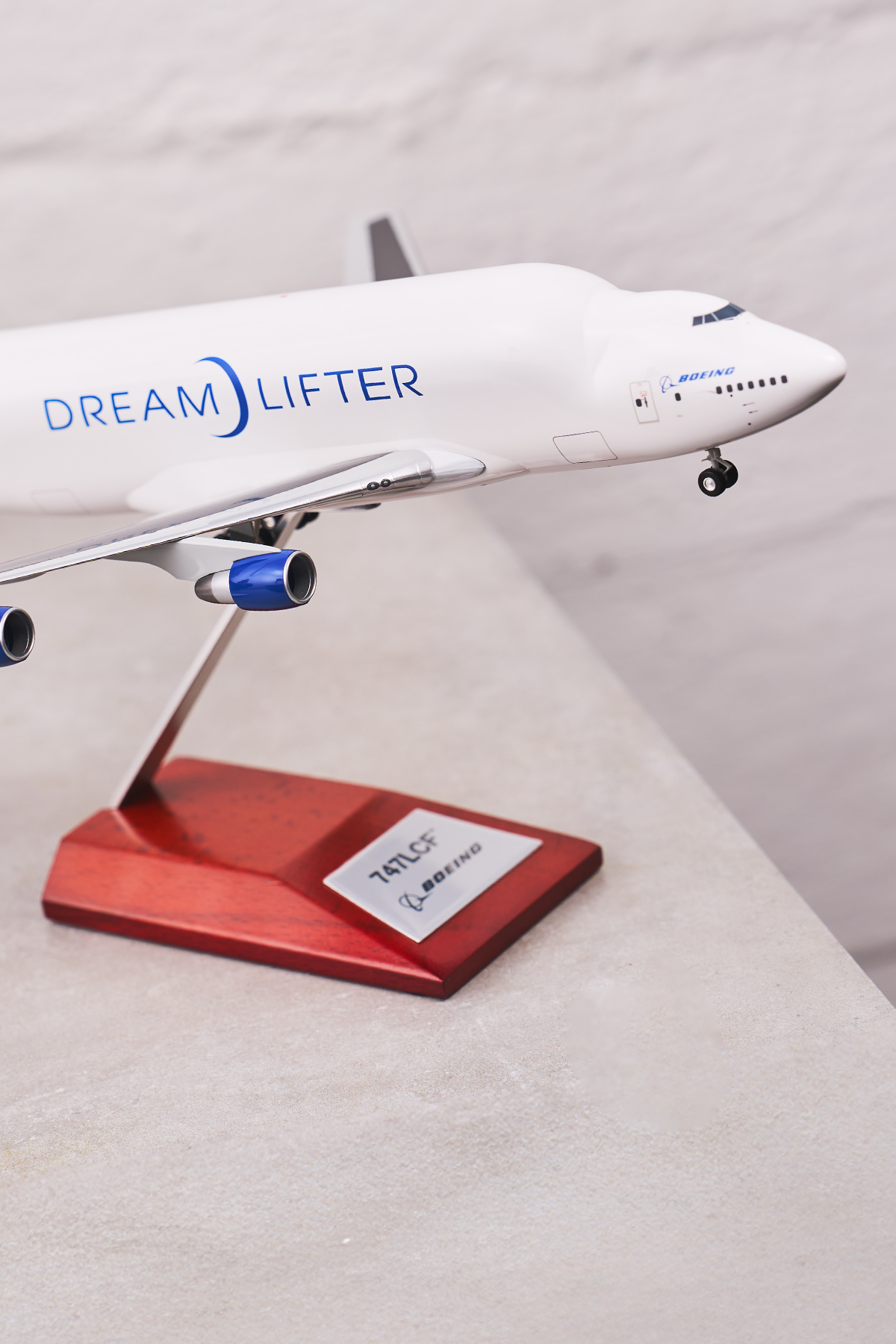 A detailed model of the Boeing Dreamlifter aircraft, showcasing its distinctive design and branding.