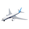 The Daron Boeing 787 Dreamliner Die-Cast Toy, featuring a white body with blue accents and twin engines, is shown in mid-flight. Its sleek design appeals to aviation enthusiasts. The plane is oriented diagonally against a plain white background.