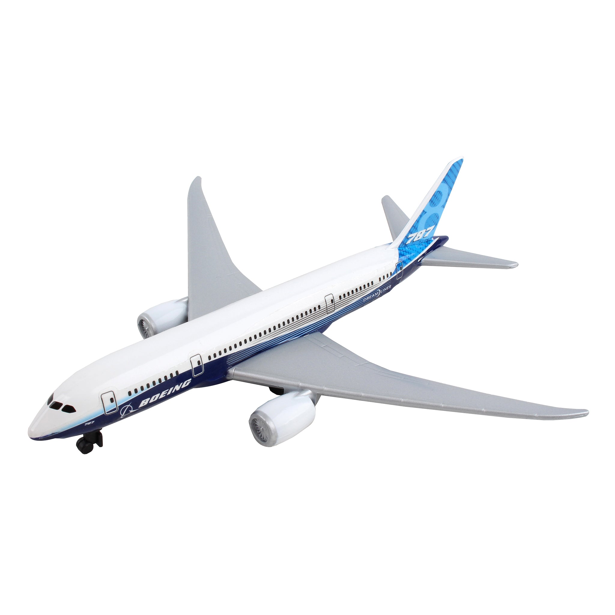 The Daron Boeing 787 Dreamliner Die-Cast Toy, featuring a white body with blue accents and twin engines, is shown in mid-flight. Its sleek design appeals to aviation enthusiasts. The plane is oriented diagonally against a plain white background.