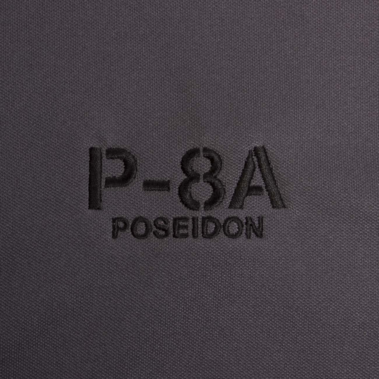The Boeing Stores Boeing P-8A Polo features black fabric with P-8A POSEIDON in black thread, offering UV protection and moisture-wicking for added comfort and style.