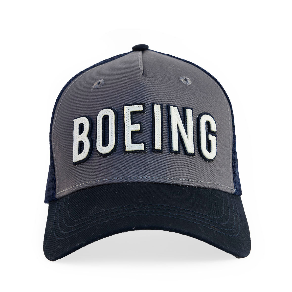 The Boeing Stores Red Canoe Boeing Trucker Hat is a gray and black cotton twill cap with BOEING in bold white letters, a mesh back, and curved brim.