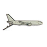 The Boeing Stores Boeing KC-46 Illustrated Magnet features a minimalist enamel design of a side-view commercial airplane, capturing the essence of classic Boeing aesthetics.