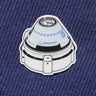 A Boeing Illustrated Starliner Lapel Pin by The Boeing Store features a spacecraft design on blue fabric. It showcases an epoxy finish and small logos, including the Boeing logo, for a realistic touch.