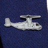The Boeing Stores silver tone Boeing Illustrated V-22 Lapel Pin, resembling a military aircraft and enhanced with an epoxy finish, is attached to a dark blue suit fabric.