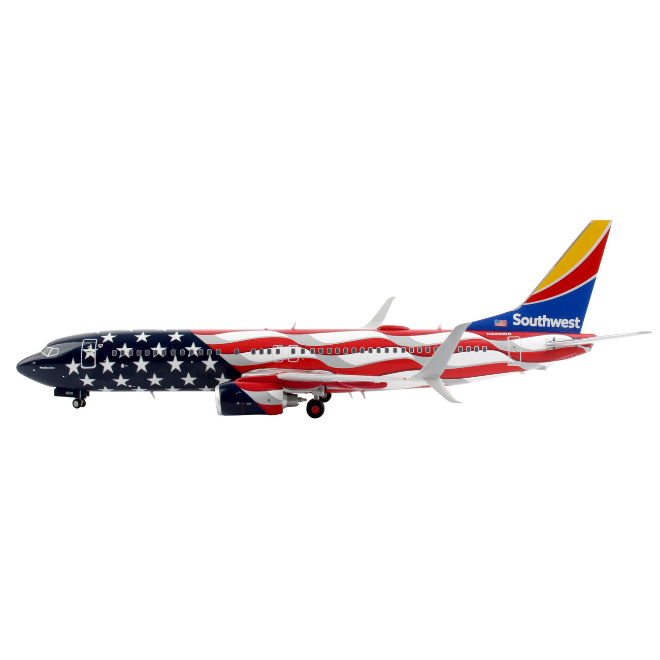 The Daron Southwest Airlines Boeing 737-800 Freedom 1:200 Model features a patriotic American flag design with stars on a blue background and red and white stripes, showcasing its signature tail in red, yellow, and blue. It includes realistic landing gear for added authenticity.