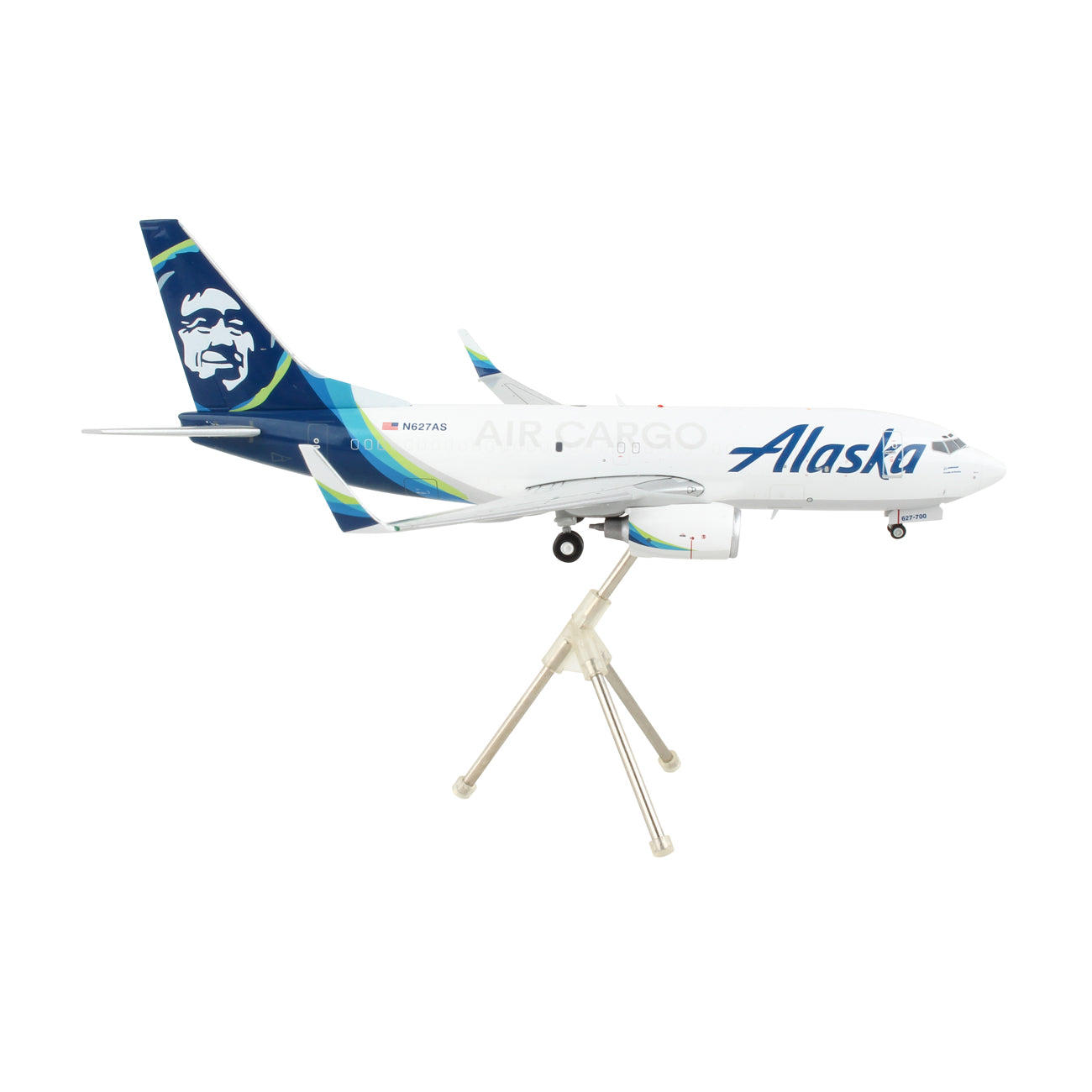 The Daron Alaska Airlines Boeing 737-700 Cargo 1:200 die-cast model features blue and green livery, the Alaska logo, and a tail face, displayed on a white stand against a plain white background.