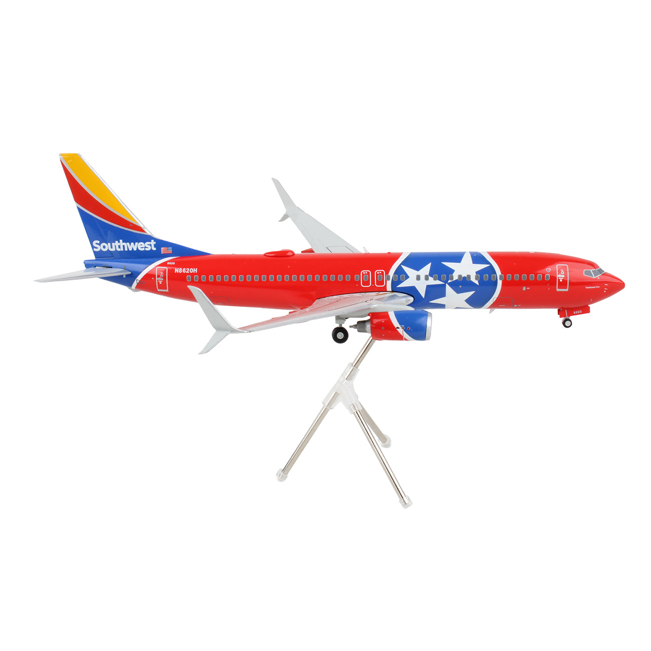 The DARON Southwest Airlines Boeing 737-800S 1:200 die-cast model features a red fuselage with a blue circle and white stars, mounted on a display stand, and has the Southwest logo in red, yellow, and blue on the tail.