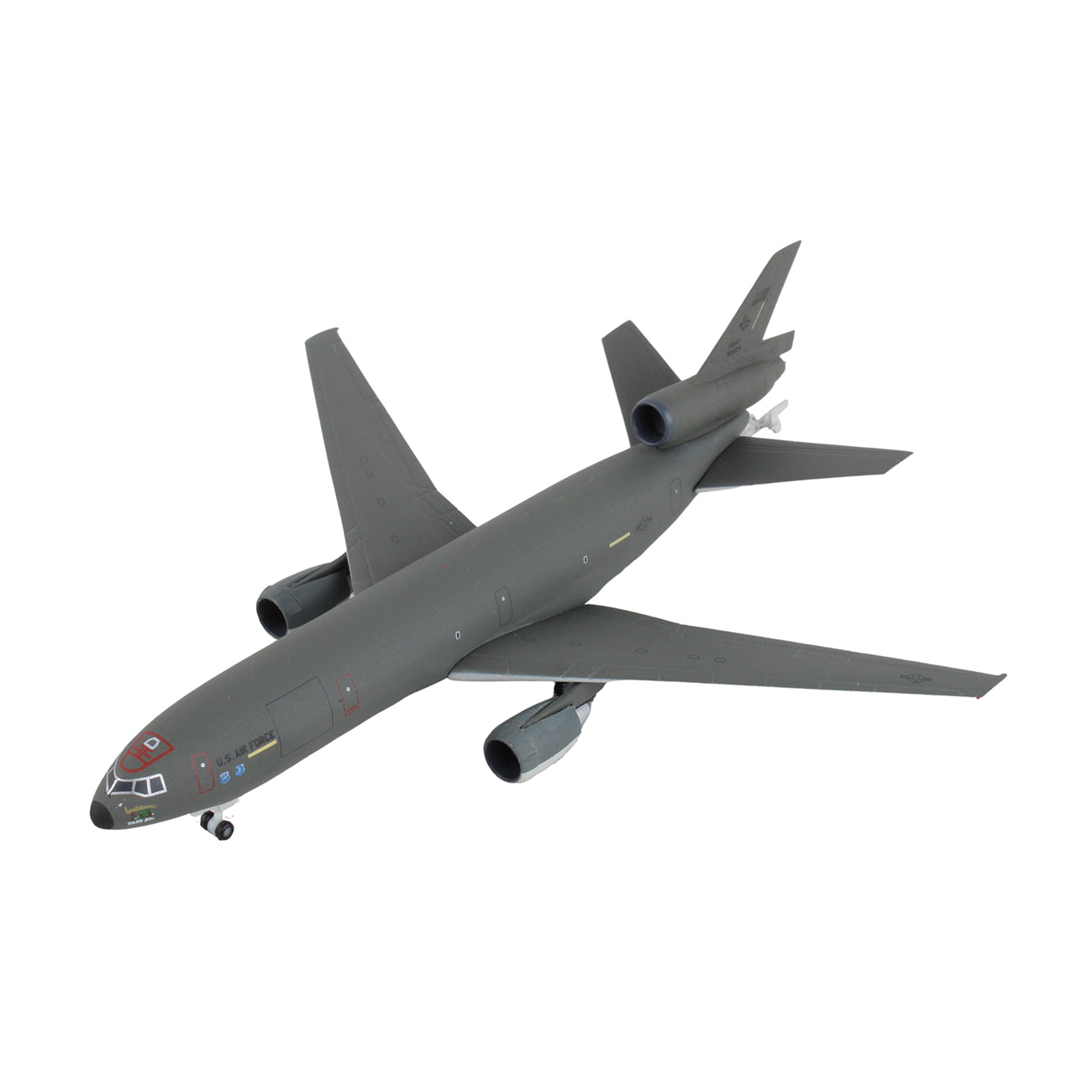 The DARON Boeing KC-10A USAF 1:500 Model is a gray die-cast military aircraft with three engines, detailed landing gear, realistic markings, and a refueling boom under the tail, displayed against a white background.