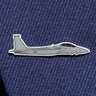 The Boeing Store presents the Boeing Illustrated F-15 Lapel Pin, a sleek gray fighter jet pin with black outlines and an epoxy finish. Its set against blue textured fabric, perfect for suits or ties.