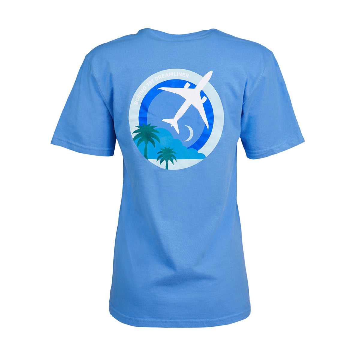 The Boeing 787 Dreamliner Skyward Unisex T-Shirt by Boeing features a blue roundel design with an airplane flying over palm trees and a crescent moon, embodying the spirit of adventure.