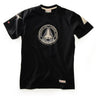 Introducing the Red Canoe NASA ALT T-Shirt by Boeing—a black tee featuring a circular Space Shuttle Approach and Landing Test (ALT) patch on the chest, complemented by additional space-themed patches on the left sleeve and near the hem. This classic, NASA-inspired shirt is perfect for any aspiring astronaut.