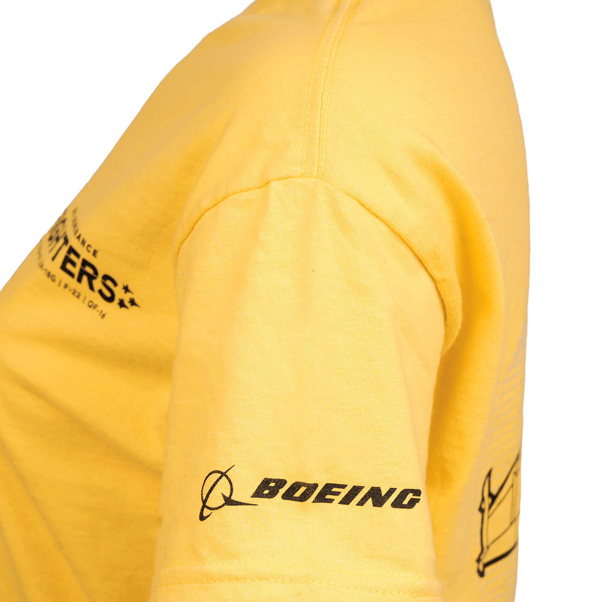 A person wearing a Boeing EA-18G Growler Unisex T-Shirt shows off the yellow shirt with Boeing on the sleeve and chest graphics celebrating the electronic warfare aircraft.