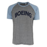 The Boeing Mens Jersey T-Shirt by BOEING features light blue sleeves, a heather gray body, and BOEING boldly printed in dark blue across the chest for a sporty look.