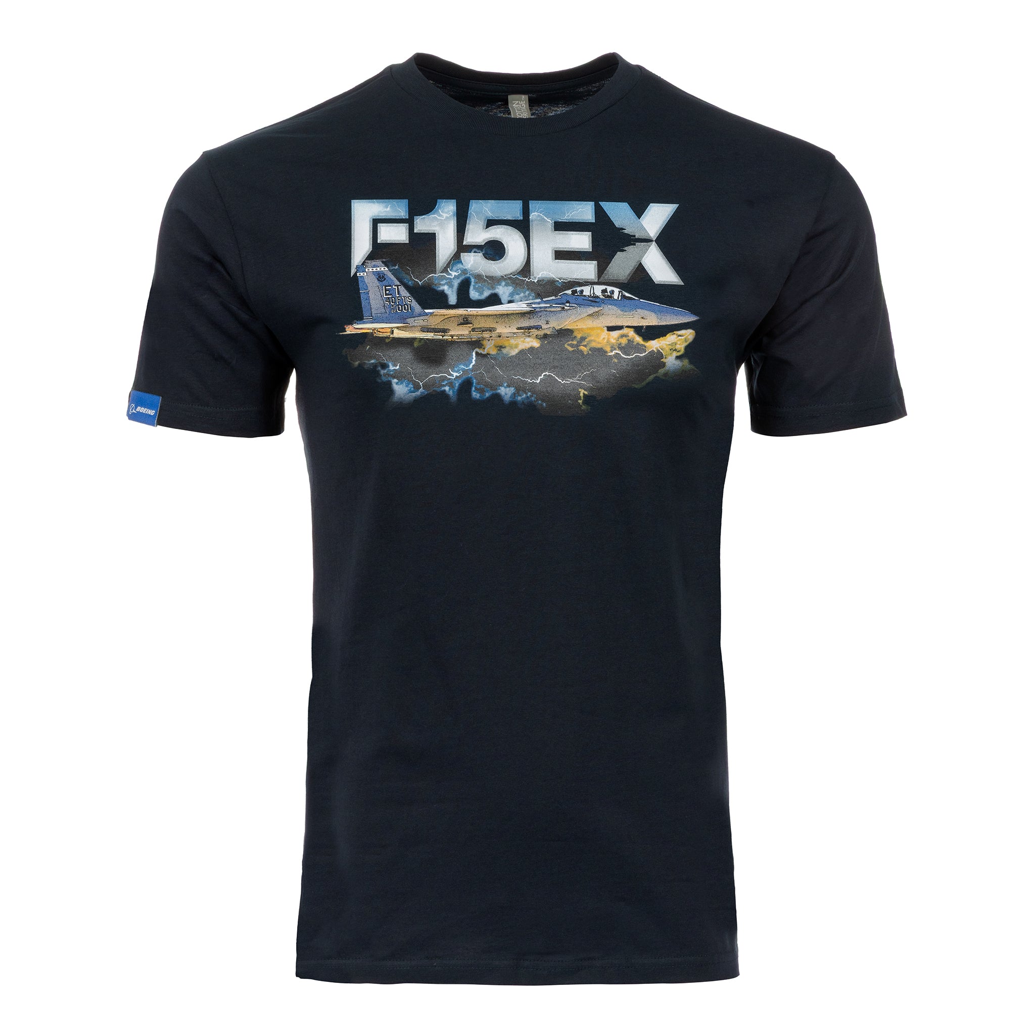 The Boeing F-15EX Eagle II Unisex Graphic T-Shirt by BOEING features a striking graphic of the F-15EX jet soaring through clouds with bold "F-15EX" text above—ideal for aviation fans.
