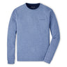 The Peter Millar Boeing Men’s Crown Comfort Crewneck is a light blue, long-sleeve sweater featuring shoulder seam detailing and a small Boeing logo on the chest. Lightweight and breathable, it includes a Peter Millar collar tag.