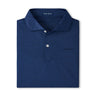The Peter Millar Boeing Men’s Jukebox Performance Polo is a dark blue, four-way stretch shirt with a collar, two white buttons, and a subtle Boeing logo on the left chest. The inside collar label displays Peter Millar branding.