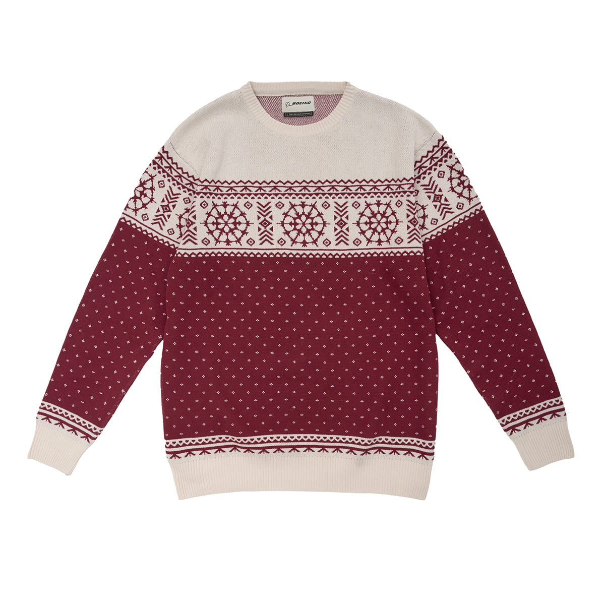 The Boeing 2025 Jet Snowflake Unisex Sweater by BOEING features a maroon and cream Nordic pattern on the chest and shoulders, white polka dots on the lower body and sleeves, and cream-colored collar, cuffs, and hem.
