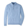 Peter Millar Boeing Men’s Dorset Sweater Polo in light blue Merino wool, featuring long sleeves, a collar with three buttons, and the BOEING logo embroidered on the left chest. The shirt is neatly laid flat on a white background.