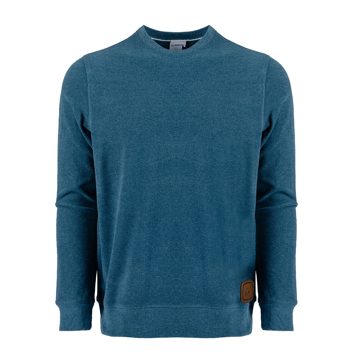 The Boeing Symbol Patch Unisex Crewneck Sweatshirt by Boeing is a long-sleeve, blue sweatshirt made from premium loungewear performance fabric. It features a crewneck design and is accented with a small brown Boeing symbol patch near the bottom hem, shown against a plain white background.