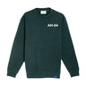 Dark green Boeing AH-64 Apache Graphic Unisex Crewneck Sweatshirt featuring a white AH-64 Apache graphic printed on the upper left chest.