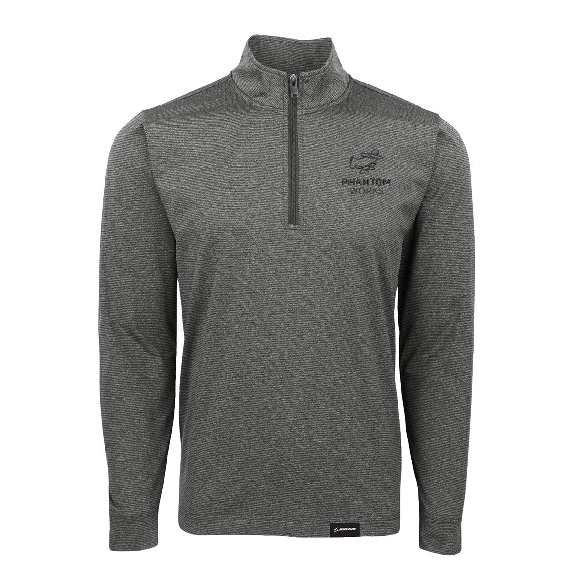 The Boeing Phantom Works Men’s Quarter-Zip Pullover by BOEING is a gray, long-sleeve top made from a spandex blend fabric for enhanced comfort and flexibility. This moisture-wicking pullover features “PHANTOM WORKS” and a logo on the left chest, offering a professional silhouette with a zipper that extends from the chest to the collar.