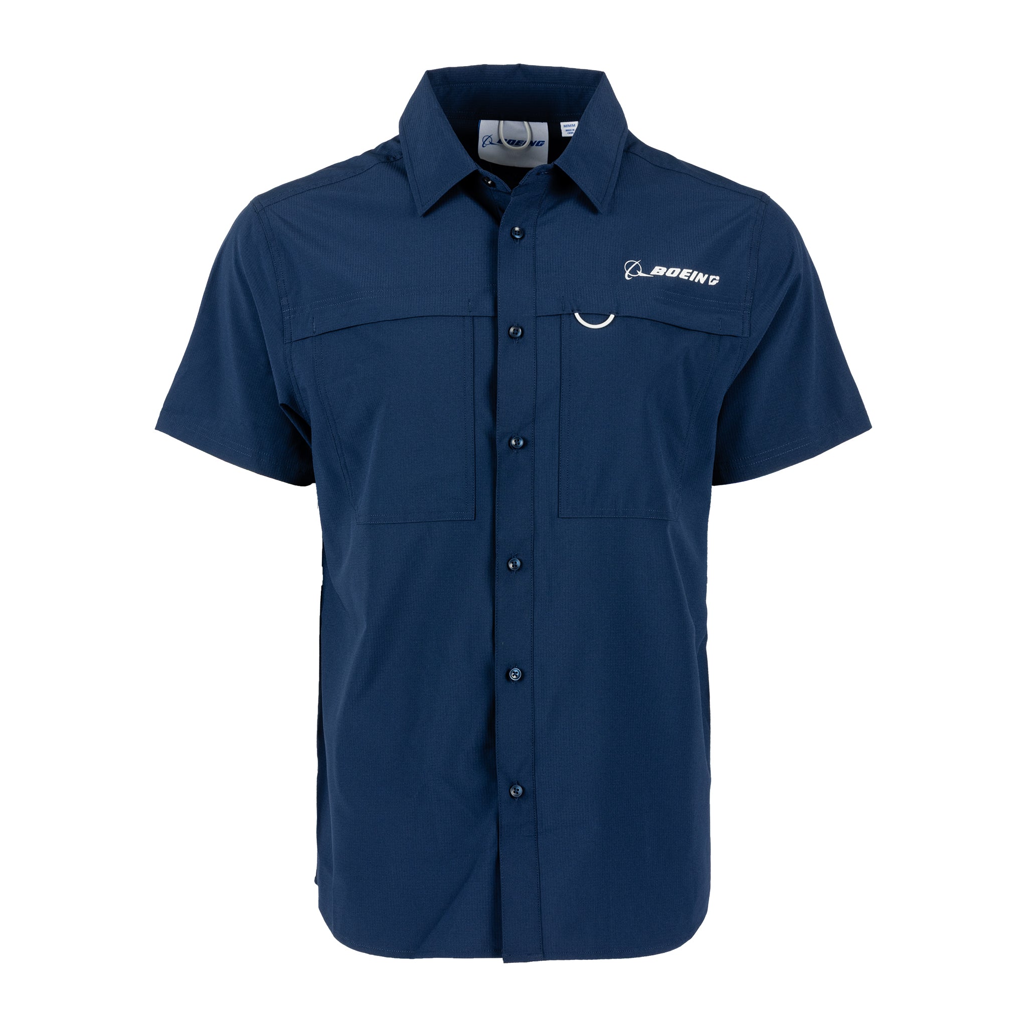 Introducing the BOEING Signature Logo Men’s Short Sleeve Utility Shirt in navy blue, featuring two chest pockets and a white Boeing logo on the left chest. Crafted with quick-dry technology and UPF 50+ protection, this shirt offers both comfort and functionality. Displayed against a plain white background.