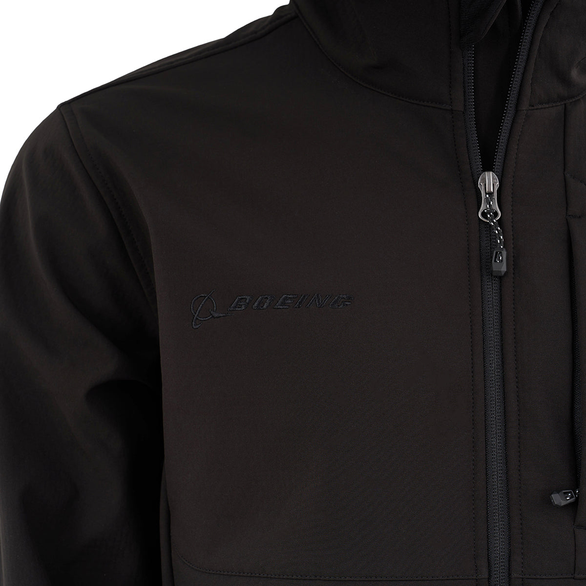 Close-up of the Boeing Men's Softshell Jacket by BOEING, featuring an embroidered chest logo, wind-resistant material, high collar, and a vertical chest zipper pocket for extra functionality.