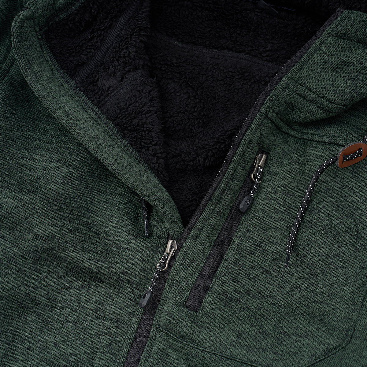 Close-up of the Boeing Men's Full-Zip Fleece Sweater by BOEING, featuring a green zip-up design, black soft Sherpa lining, visible zippers, and a collar drawstring.