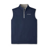 The Peter Millar Boeing Men’s Galway Quarter-Zip Performance Vest features a navy blue, sleeveless design with a light gray inner collar, front quarter-zip closure, and the Boeing logo on the left chest. Crafted from performance fabric, this BOEING vest is water repellent and showcases a modern, minimalist style.