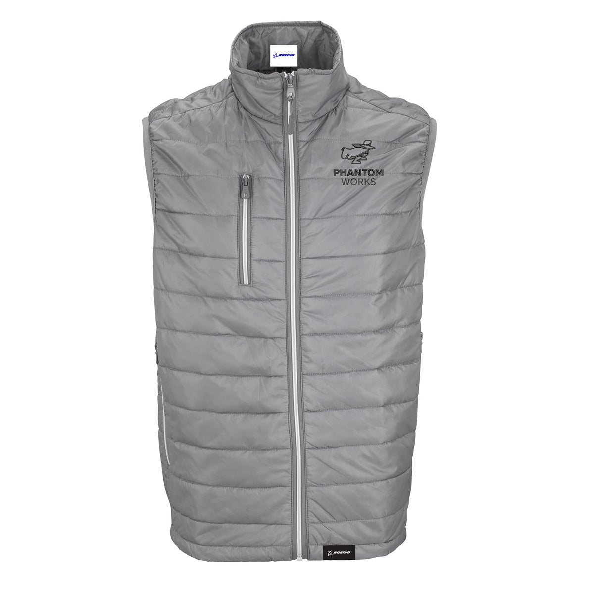 Introducing the Boeing Phantom Works Men’s Quilted Vest by BOEING—a gray, water-repellent vest featuring a front zipper, a zippered chest pocket, and the PHANTOM WORKS logo with an aircraft graphic on the left chest. This stylish and functional vest is perfect for everyday wear.
