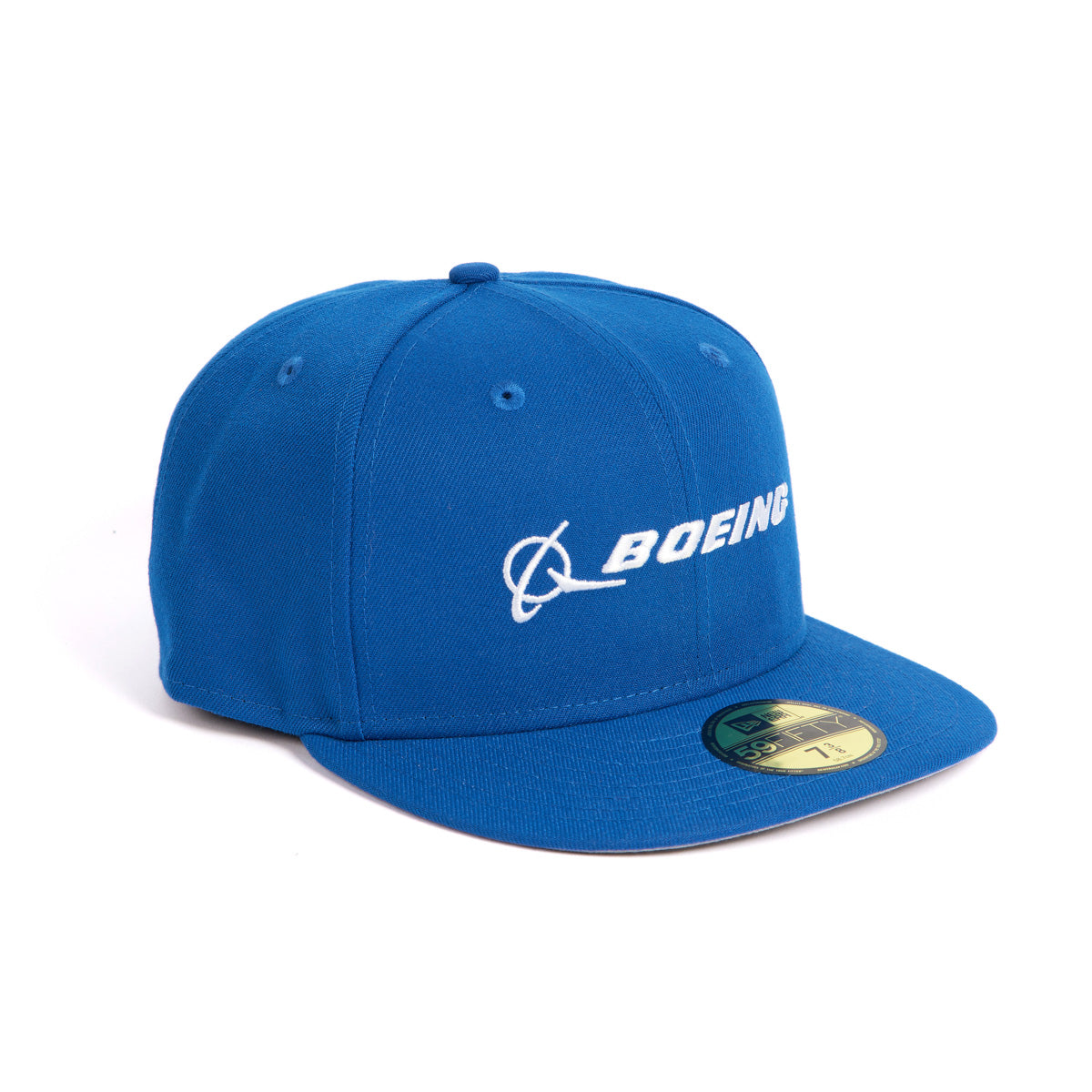The New Era 59FIFTY Boeing Signature Logo Hat by The Boeing Store is a blue fitted baseball cap with a flat brim, featuring the iconic white embroidered Boeing logo on the front and a size sticker on the brim for style and authenticity.
