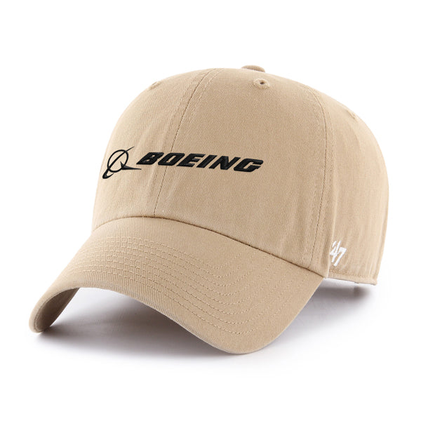 The Boeing Stores 47 Clean Up Hat in beige displays a black Boeing Signature Logo on the front and features a white embroidered 47 on the left. Made from cotton twill, it has a sleek design with a curved brim.