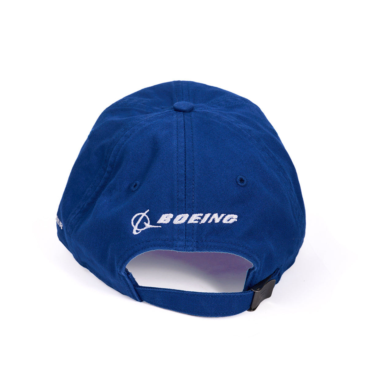 The image shows the back of a Boeing 787 Dreamliner Skyward Hat by Boeing, featuring a blue color with the white embroidered logo and text. It has an adjustable cloth backstrap with a black buckle, set against a plain white background.