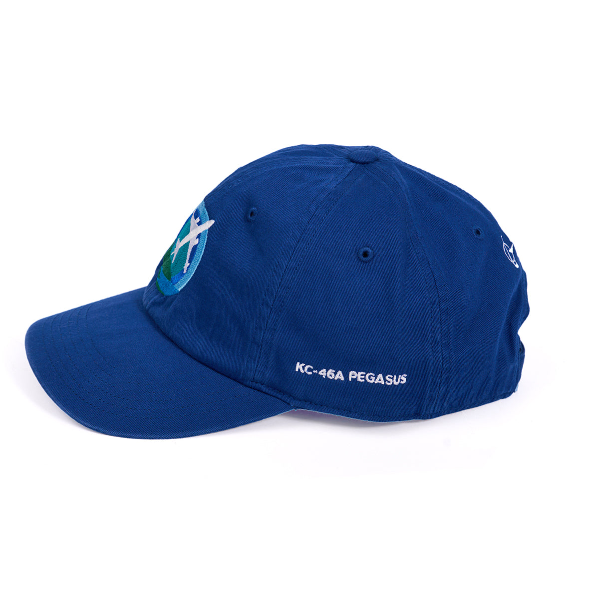 Introducing the Boeing KC-46 Pegasus Skyward Hat: a blue baseball cap with an embroidered logo and globe design on the front, “KC-46A PEGASUS” text on the side, curved brim, visible stitching, and an adjustable cloth backstrap for comfort and style.