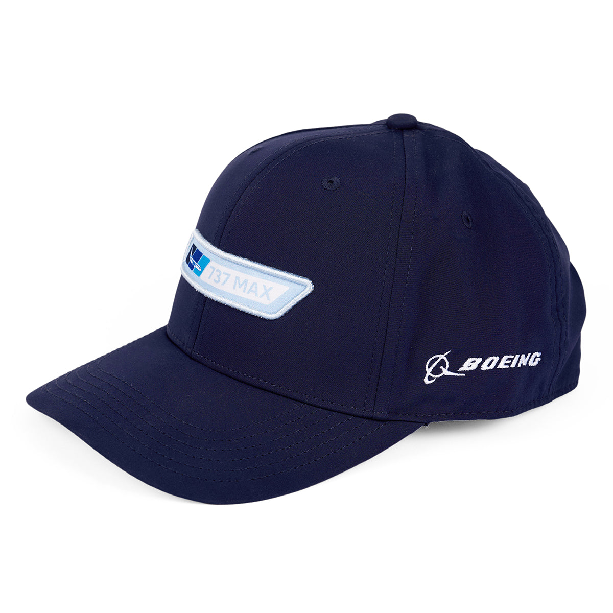 The Boeing 737 MAX Velocity Unisex Hat, in dark blue, features a light blue and white embroidered patch on the front. It includes the Boeing logo and text on the side. This moisture-wicking cap has an adjustable velcro closure for a comfortable fit.