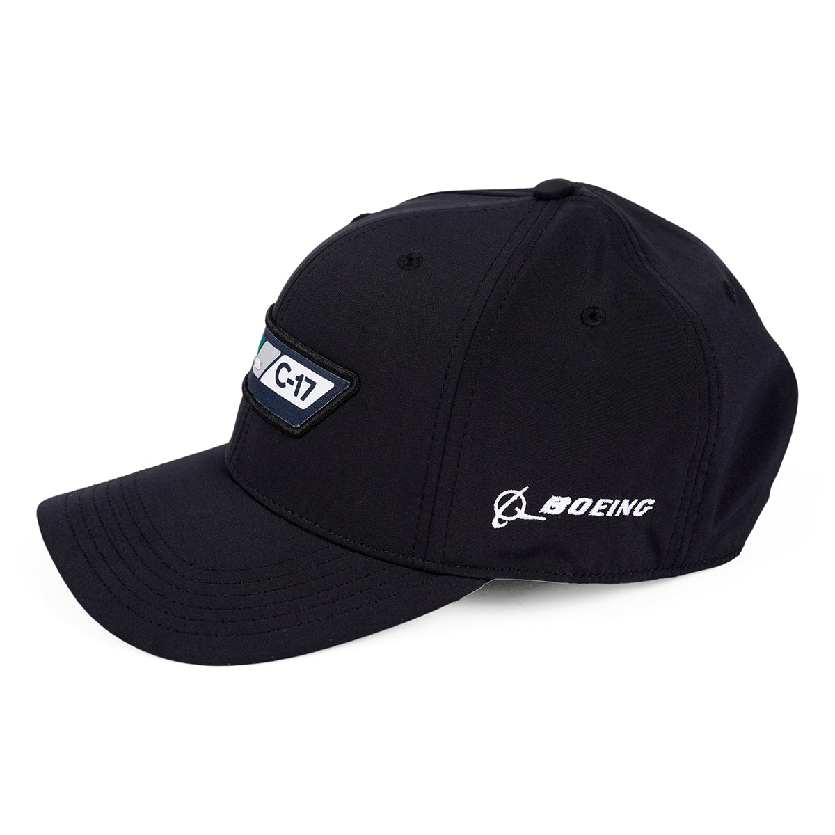 The Boeing C-17 Globemaster Velocity Unisex Hat is a black cap featuring a C-17 emblem on the front, a white Boeing logo on the side, an adjustable Velcro closure for optimal fit, and a curved brim with visible stitching.