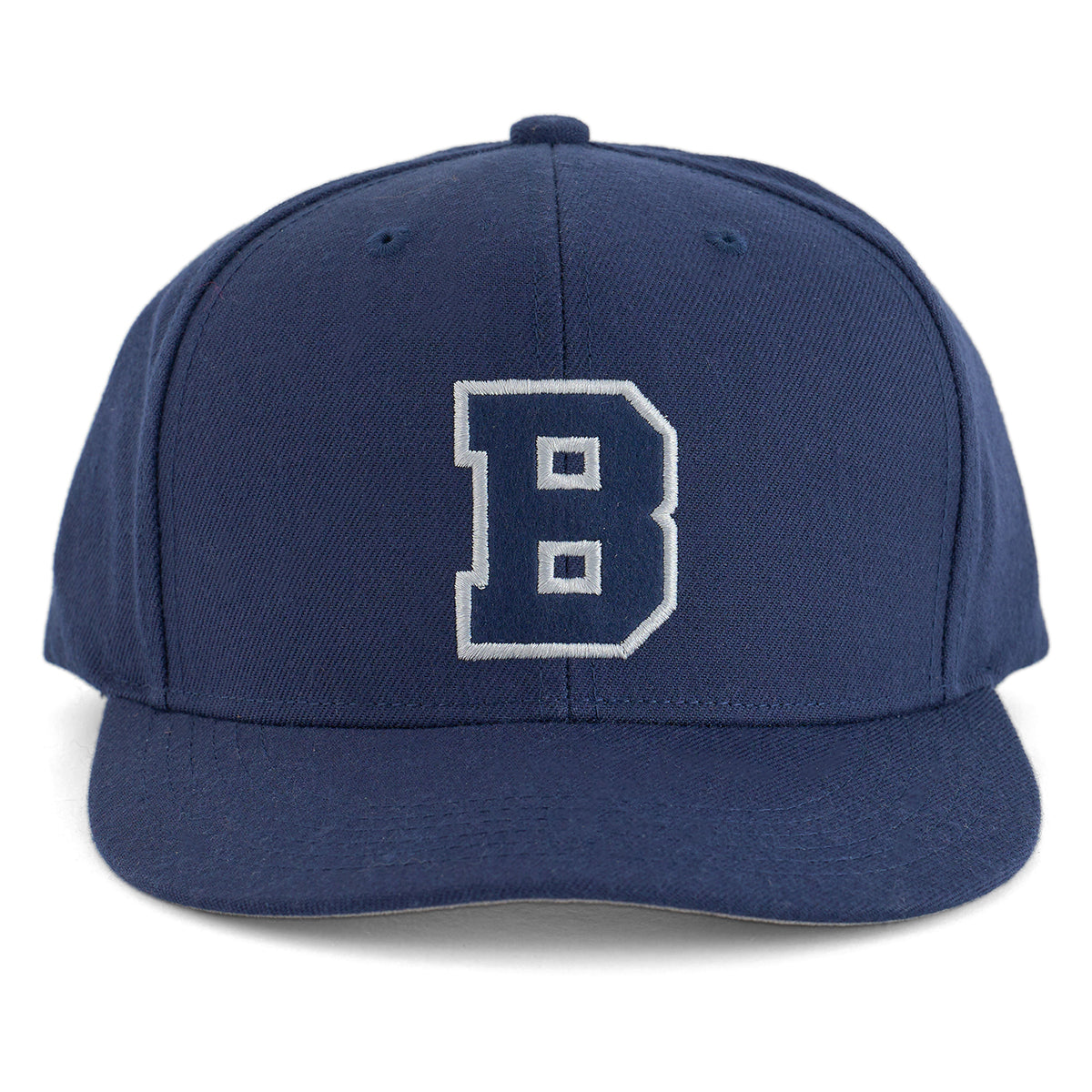 The Boeing Varsity Snapback Hat from The Boeing Store features a navy blue design with a large white-bordered letter B—perfect for aviation enthusiasts.