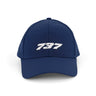 The BOEING 737 Series Hat is a navy blue baseball cap with a bold white 3D 737 logo on the front panel and a textured surface for added style.