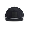 The Melin Boeing Symbol Logo Coronado Hat by BOEING is a black snapback with a flat brim, reflective strip, perforated sides, and a square patch with the stylized Boeing logo. Its moisture-wicking design keeps you comfortable all day.