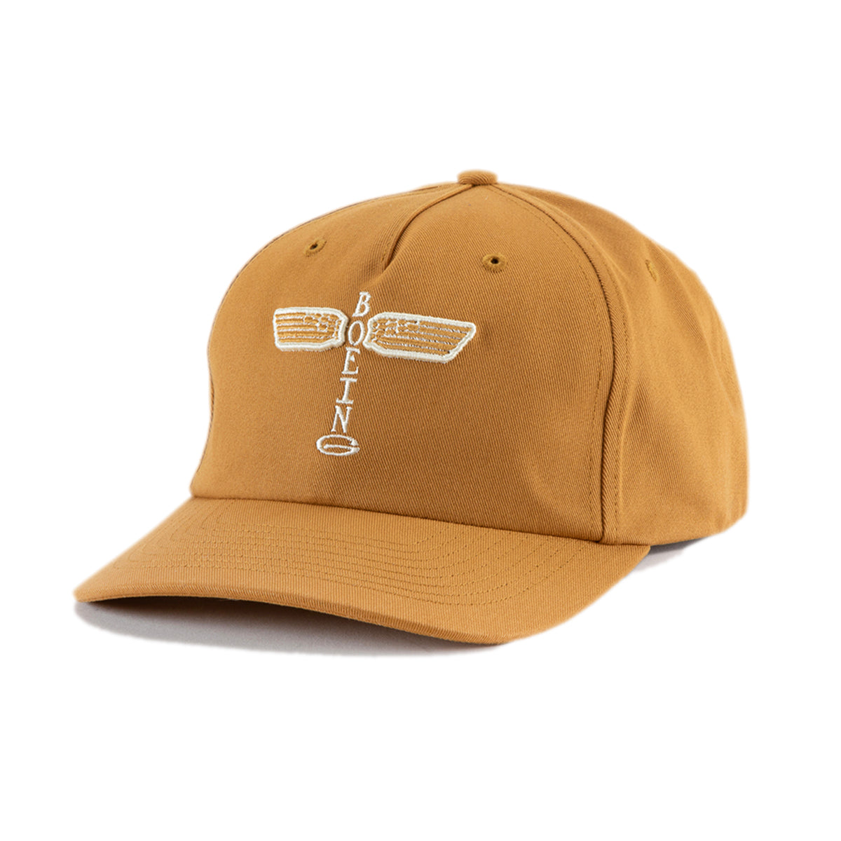 The Richardson Boeing Airplane Logo Snapback Hat by BOEING features a mustard yellow color, curved brim, embroidered winged design, and the word "BOEING" in white vertically on the front.