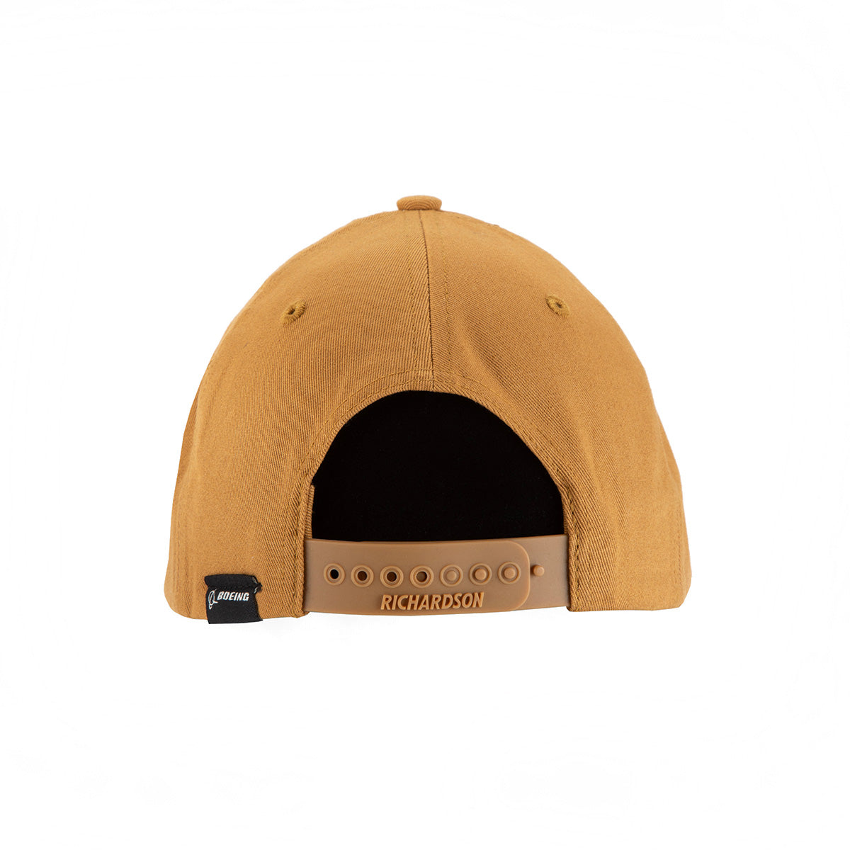 The BOEING Richardson Boeing Airplane Logo Snapback Hat is a tan cap viewed from the back, with an adjustable snapback closure and a black side tag—ideal for aviation heritage fans.