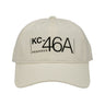 The Boeing KC-46A Pegasus Graphic Hat by BOEING features bold "KC-46A PEGASUS" lettering on a white cap—ideal for aviation fans and Boeing enthusiasts.