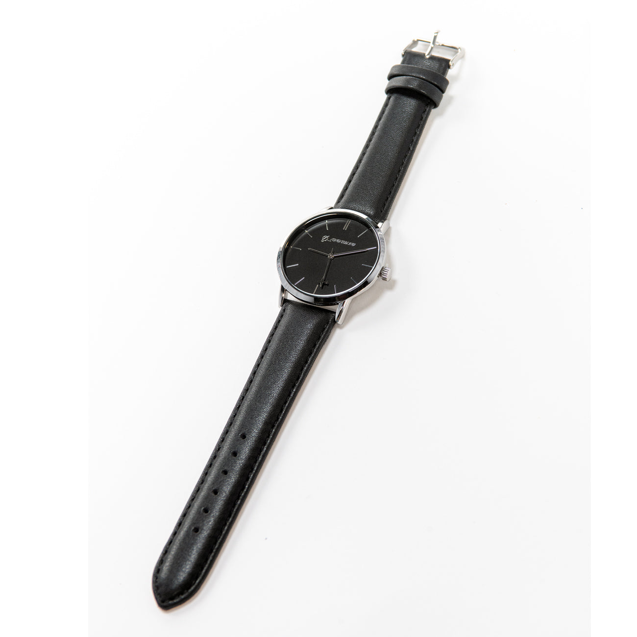 The Boeing Silver Rotating Airplane Watch showcases a sleek mens design with a black leather strap and watch face, featuring distinctive silver markers and hands reminiscent of Boeing precision. It rests elegantly against a plain white surface.