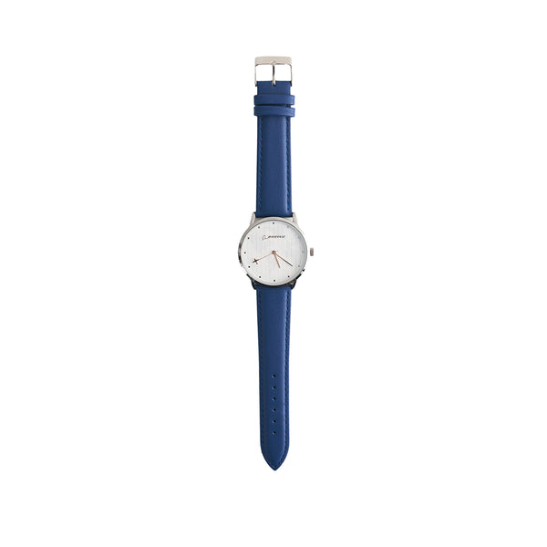 The Boeing Men's Rotating Watch by BOEING features a white round dial, silver bezel, minimalistic design, blue leather strap, Japan quartz movement, and silver hands that contrast with the plain white face.