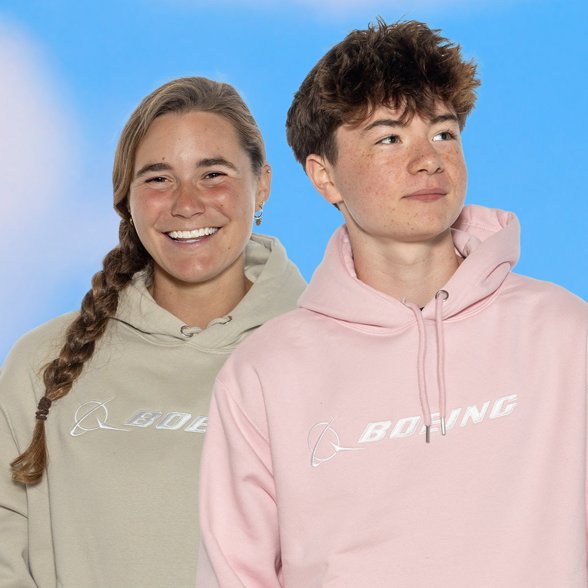 Two individuals wearing hoodies, one in a light beige color and the other in pink, both featuring the Boing signature logo.